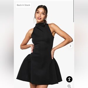 Elegant Black Sleeveless Dress

Racer Neck Volume Mini Dress